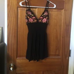 Black and floral romper